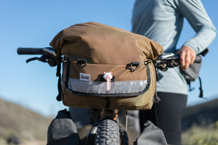 Middle Earth Jammer Handlebar Bag: 13L - Hybrid Teal Pink Turmeric Purple Cordura