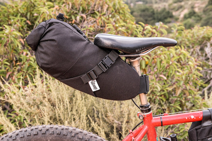 Sleeper Bikepacking Saddle Bag: 6L - Hybrid Teal Pink Turmeric Purple Cordura