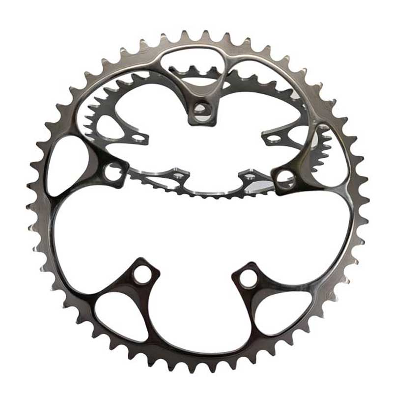 Unleash the power of precision and durability with the Boone Chainring crafted from aerospace-grade titanium. Elevate your cycling experience with this lightweight yet robust component, ensuring top-notch performance on every ride. Discover the pinnacle of innovation at CycleWyze – where aerospace-grade quality meets cycling excellence.