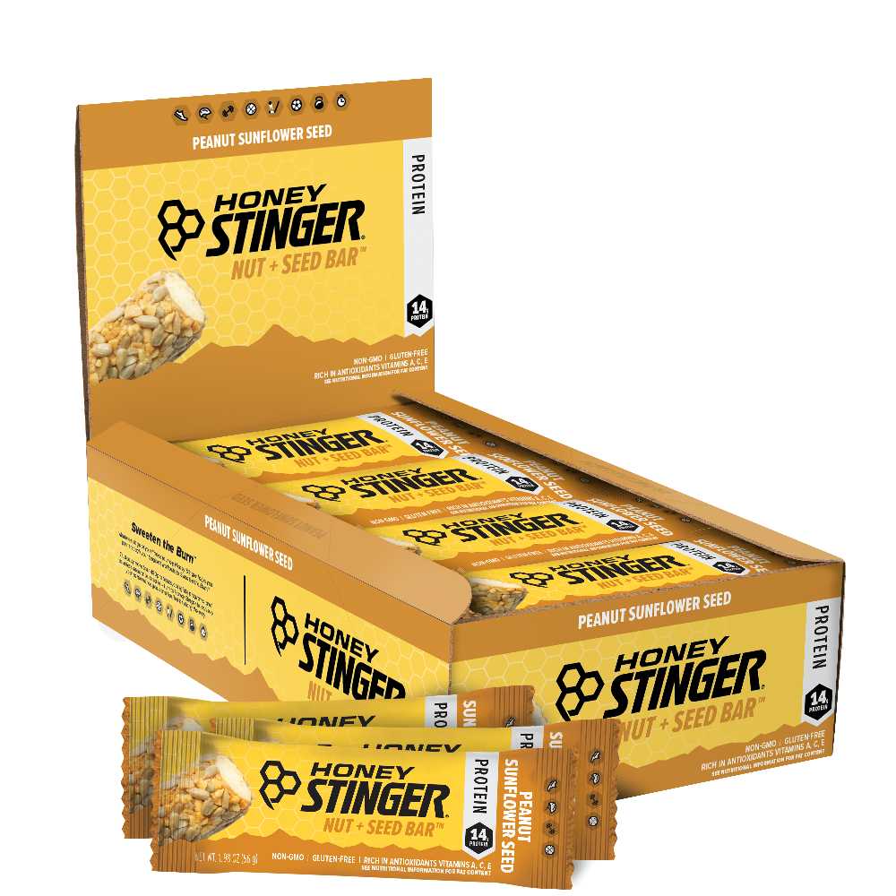 Indulge in the delicious fusion of Honey Stinger's Peanut Butter Milk Chocolate Cracker Bar Box of 12. Featuring creamy peanut butter, smooth milk chocolate, and crispy cracker layers, this treat is cyclist-approved for its perfect balance of taste and nutrition. Elevate your snacking experience with Honey Stinger's premium ingredients and convenient box of 12 bars. Fuel your active lifestyle with a delightful blend of flavors.