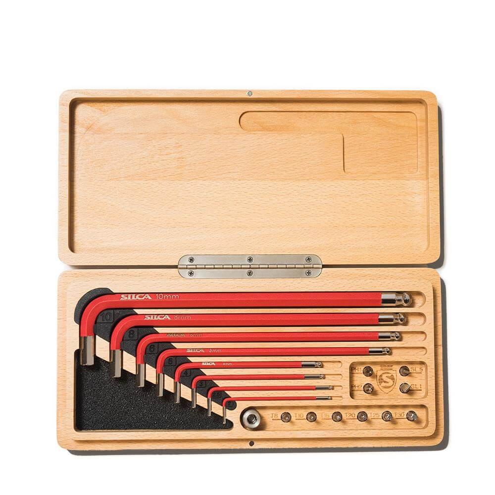 Elevate your bike maintenance game with the Silca HX-One Home Essentials Kit – the epitome of precision crafted bike accessories. Impeccably designed S-2 tool steel bits, coated for comfort, housed in a stylish Beechwood box. From hex keys to Torx bits, this comprehensive set ensures you're always ready for the ride. Upgrade your toolkit with Silca's commitment to perfection. #SilcaHXOne #BikeAccessories #PrecisionTools