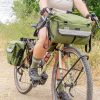 Road Runner Bags Anywhere Panniers - Adventure in the Wild: A set of bikepacking bags nestled in a natural setting.