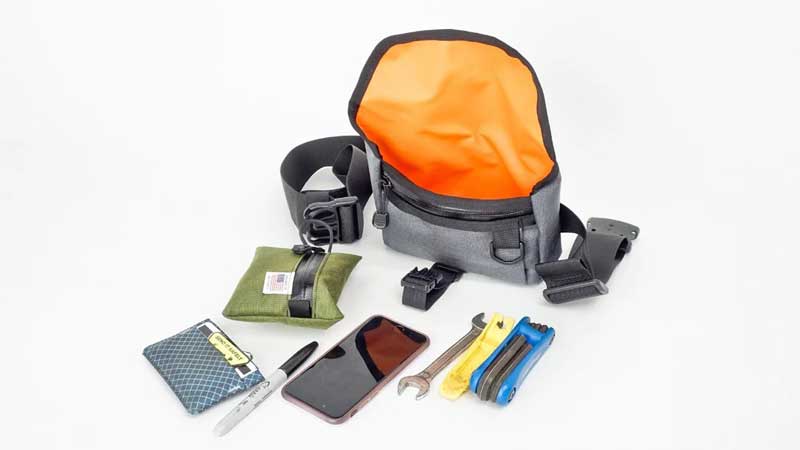 Sleek Bikepacking Storage for the Ice-Cool Urban Rider Dial up your street cred with the Road Runner Hip Bag Pro, an ultra-stylish hip pack for city rides and beyond, offering ample space and a sleek design for the modern cyclist.