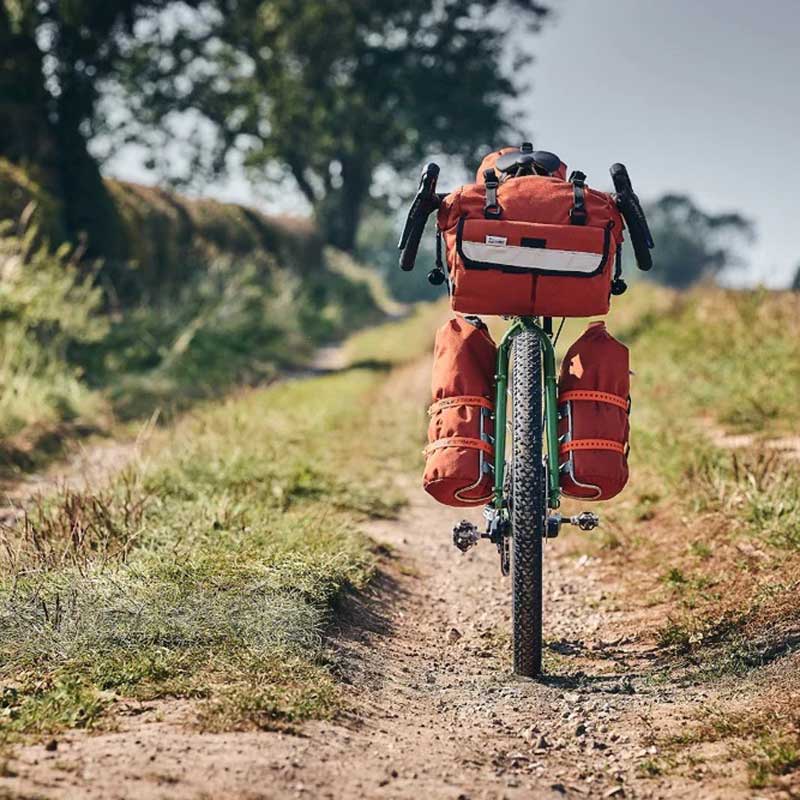 Elevate Your Ride with the Ultimate Bike Handlebar Bag Fuse functionality and style with the Middle Earth Jammer Bag by Road Runner Bags. This exceptional bike bag is designed to enhance your biking adventures, offering easy access and ample storage for your essentials.