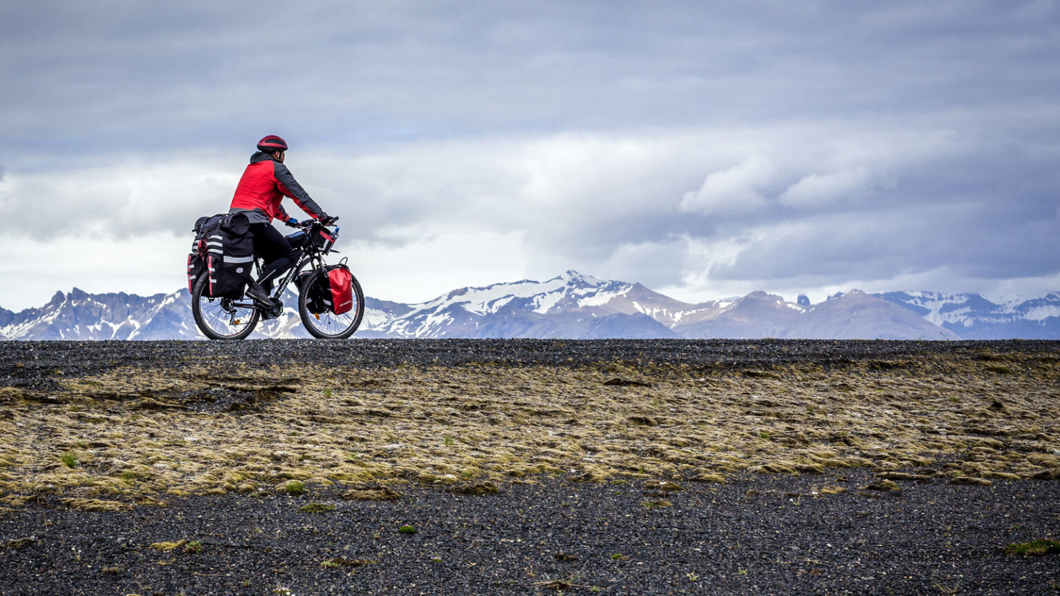 A group of bikepackers navigating rugged terrain during an advanced bikepacking adventure.